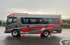 Elf Long Giga dari Iwan Tour, layanan sewa minibus eksekutif untuk perjalanan bisnis atau keluarga di Malang.